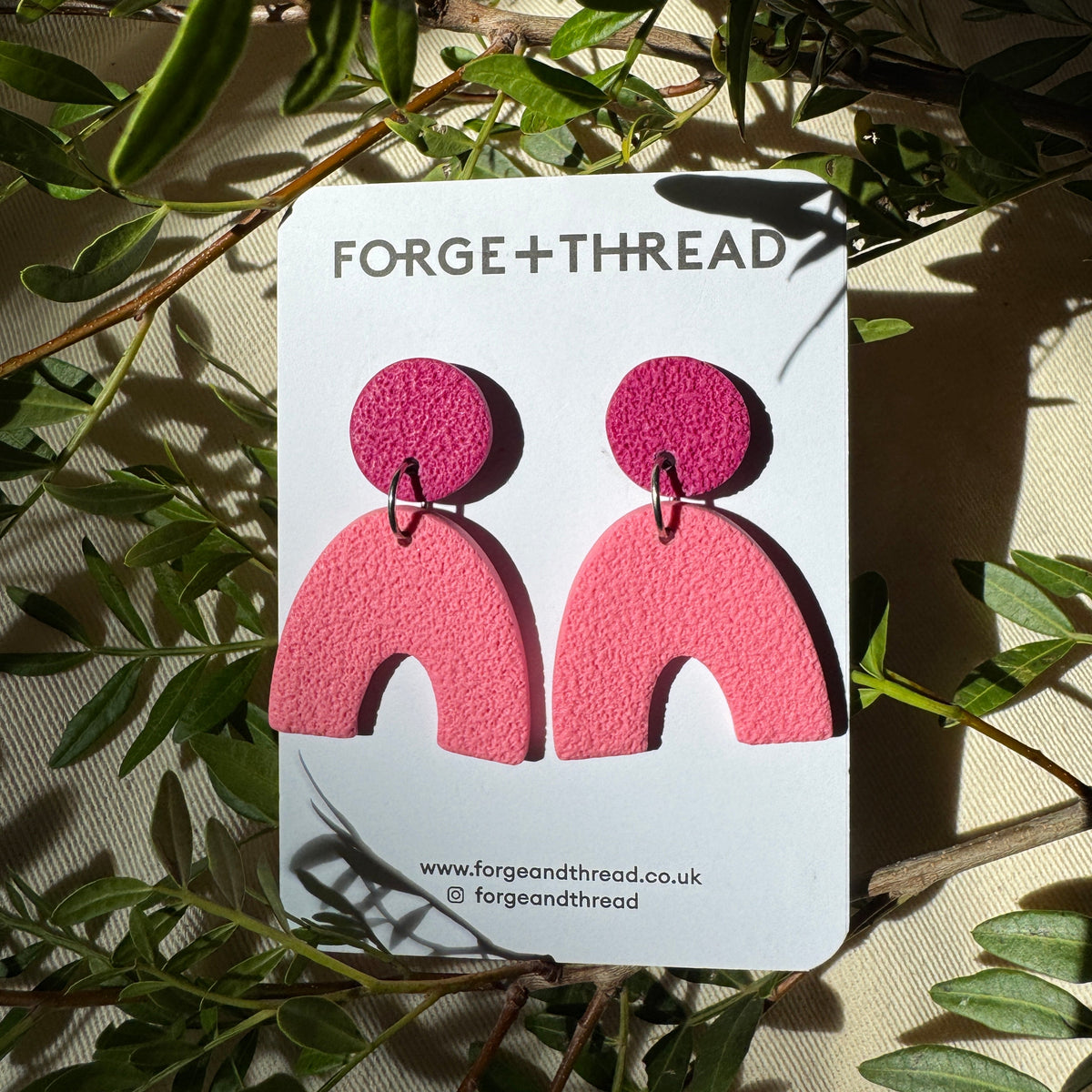 LIGHT PINK TEXTURED ARC EARRINGS
