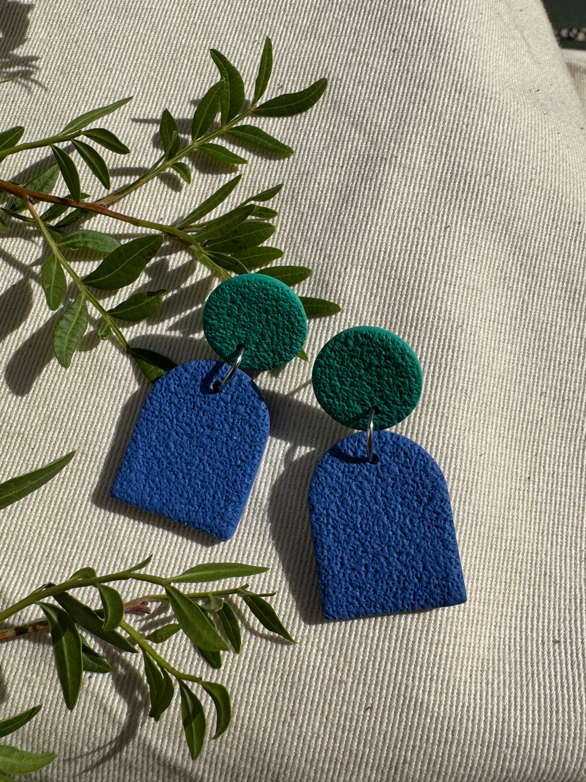 BLUE TEXTURED SMALL ARCH EARRINGS
