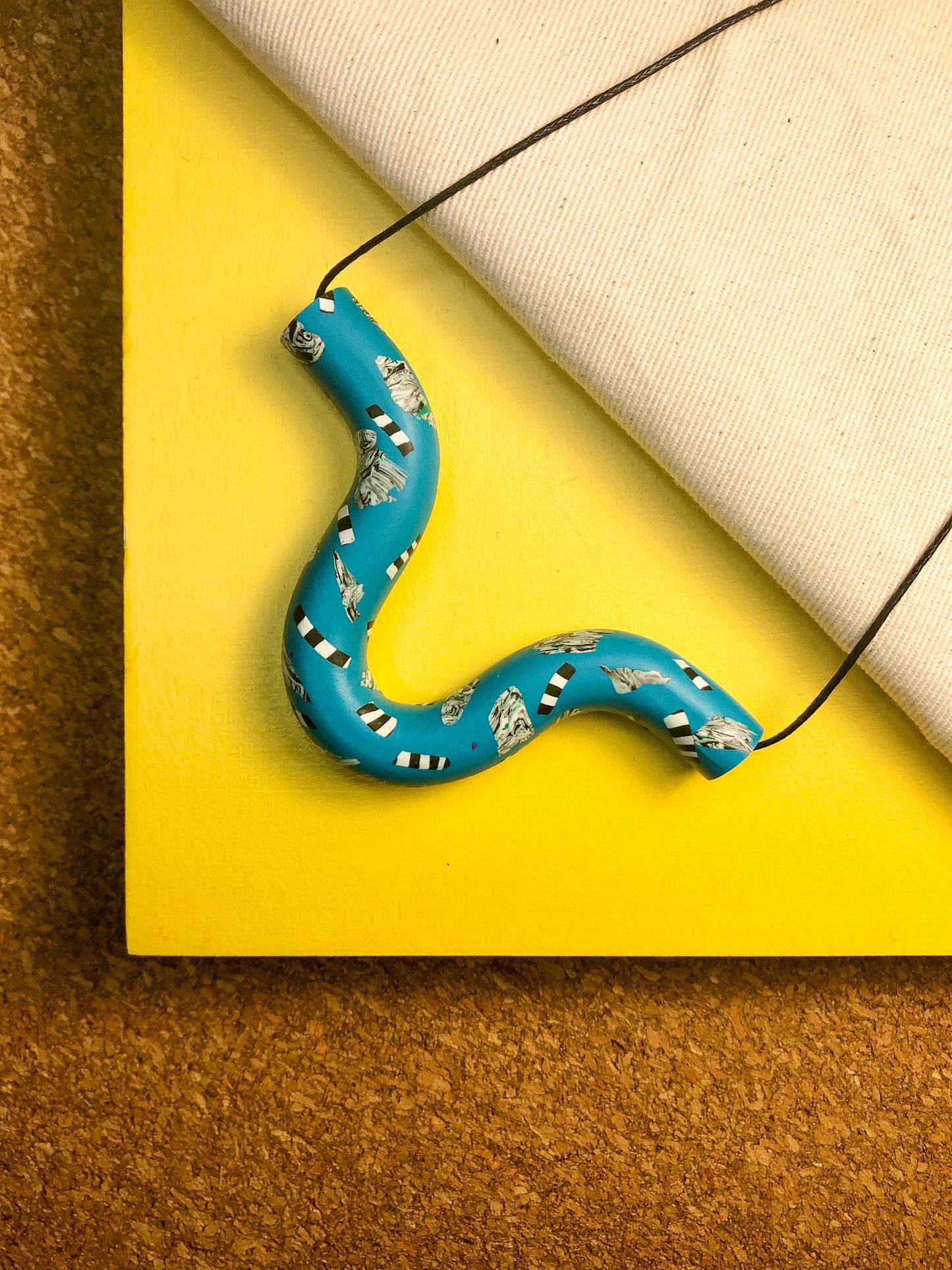 BLUE SQUIGGLE NECKLACE